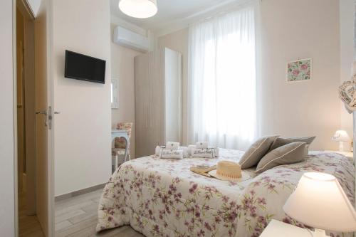 Postel nebo postele na pokoji v ubytování B&B La Casa di Otello