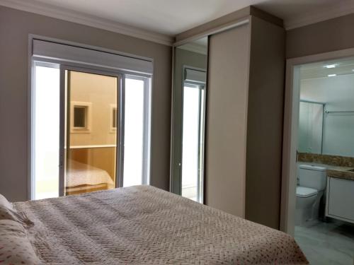 Ένα ή περισσότερα κρεβάτια σε δωμάτιο στο Lumini 103