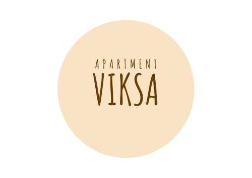 a white circle with the words appointment vyssa on it at Apartment Viksa with Jacuzzi in Zagreb