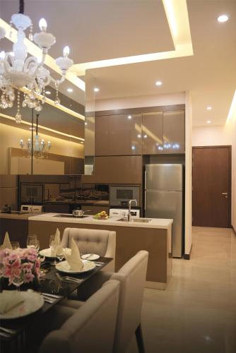 a kitchen with a table and chairs and a dining room at Dorsett Residences Bukit Bintang @Dorsett Kuala Lumpur in Kuala Lumpur