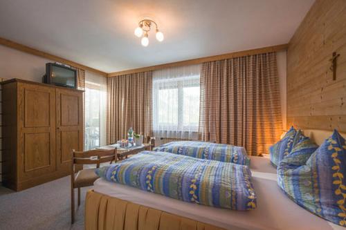 Postel nebo postele na pokoji v ubytování Haus Panorama