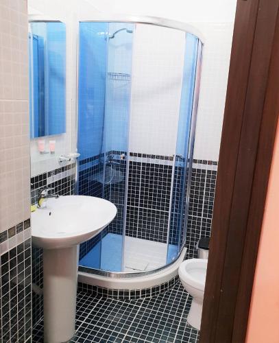 Koupelna v ubytování Comfort Apartments