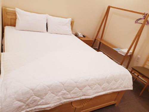 Hotel Mỹ Phươngにあるベッド