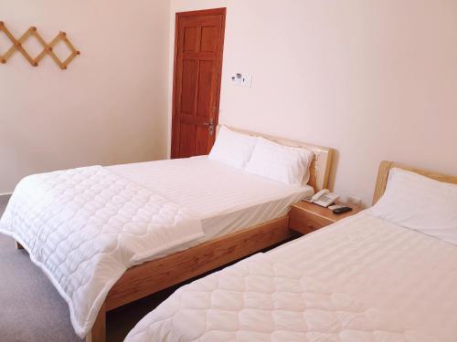 Hotel Mỹ Phươngにあるベッド