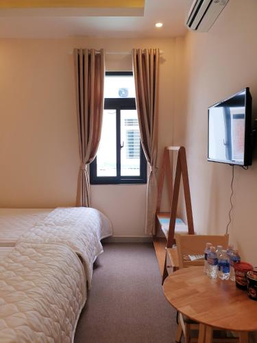 Hotel Mỹ Phươngにあるベッド