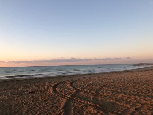 a track in the sand on a beach at Maribeach in Cavallino-Treporti