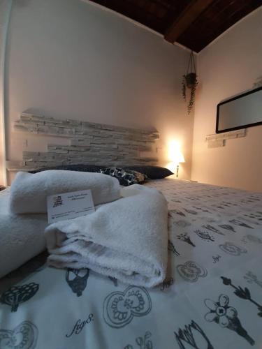 Postel nebo postele na pokoji v ubytování Smile Tower House