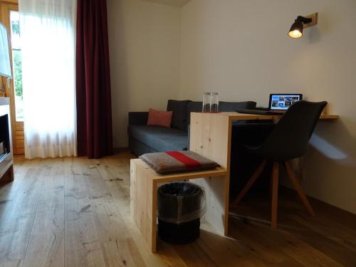 TV a/nebo společenská místnost v ubytování Schorta's Alvetern - Boutique Hotel