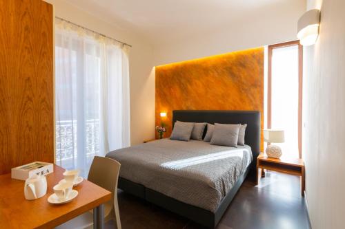 Postel nebo postele na pokoji v ubytování Il Melograno Relais