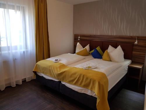 Postel nebo postele na pokoji v ubytování Hotel Milin
