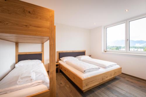 Postel nebo postele na pokoji v ubytování Motel Keckeis Inn - Self Check-in