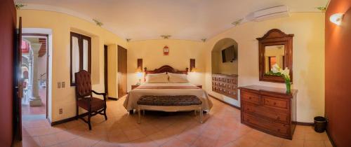 Cama o camas de una habitación en Hotel Casa Barrocco Oaxaca