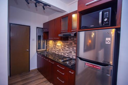 Kjøkken eller kjøkkenkrok på Seabreeze Apartment