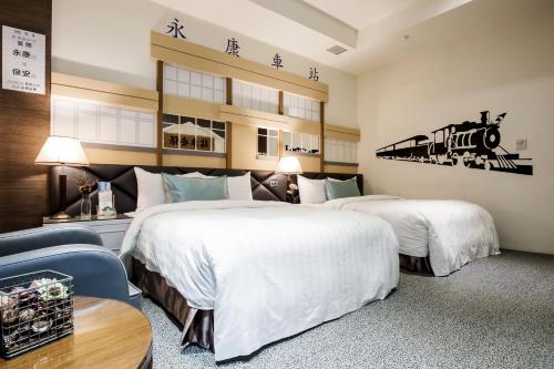 מיטה או מיטות בחדר ב-Duo Romance Hotel