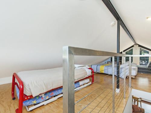 
A bunk bed or bunk beds in a room at JOHANSSON'S PERCH COTTAGE

