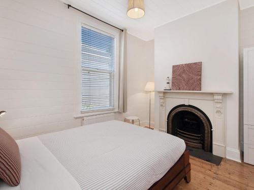 Postel nebo postele na pokoji v ubytování Kinsale Cottage