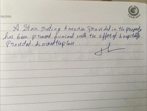 a sheet of paper with handwriting on it at Eden Studio Apartments - 1 in Colombo