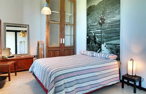 Voodi või voodid majutusasutuse Villa Mamita toas