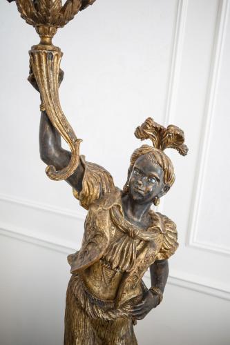 a bronze statue of a woman holding a mirror at Relais Metelli in Foligno