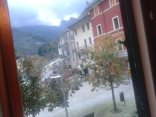 a view from a window of a street with buildings at La Pania in Stazzema