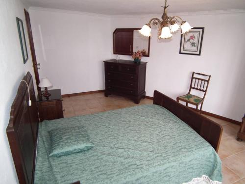 Łóżko lub łóżka w pokoju w obiekcie Moinho de Paradela Novo mit Pool