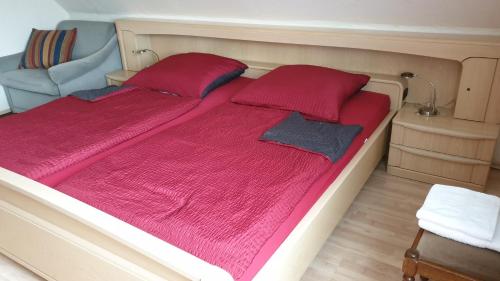 Кровать или кровати в номере Gastzimmer