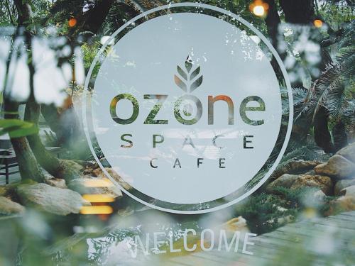 a close up of a sign for a home space cafe at Interpark Hotel & Residence, Eastern Seaboard Rayong in Ban Phan Sadet Nok