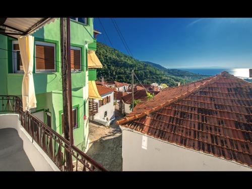 a view of a city from a balcony of a building at CHEZ KONSTANTINOS in Kallirakhi