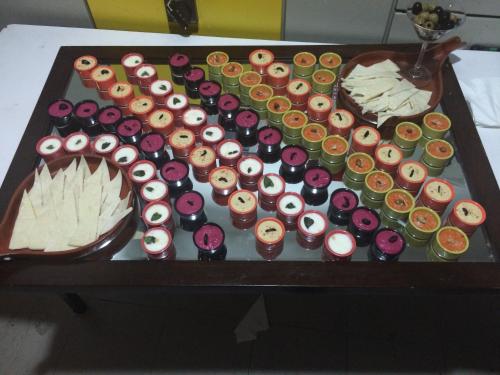 a table with a bunch of cupcakes and other desserts at Park Plaza Chandigarh Zirakpur in Chandīgarh