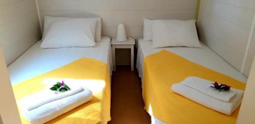 A bed or beds in a room at The PineForest Cabin