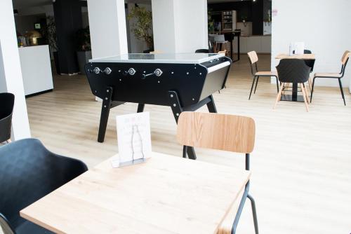 ibis Styles Lille Neuville en Ferrainにあるシーティングエリア