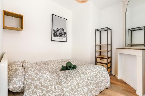 Ένα ή περισσότερα κρεβάτια σε δωμάτιο στο Cosy appartement proche gares #2