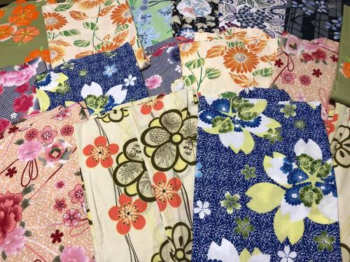 a close up of a quilt with flowers on it at Oyado Yukizumi in Kusatsu