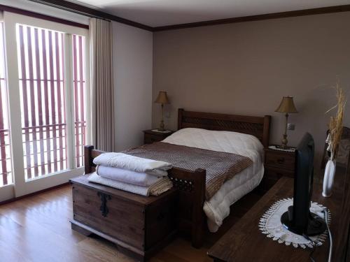 Casa Zé Manel - Turismo Rural tesisinde bir odada yatak veya yataklar