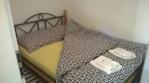 Posteľ alebo postele v izbe v ubytovaní Apartman Renata
