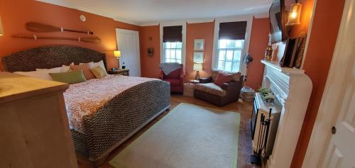 Katil atau katil-katil dalam bilik di Mansion Farm Inn