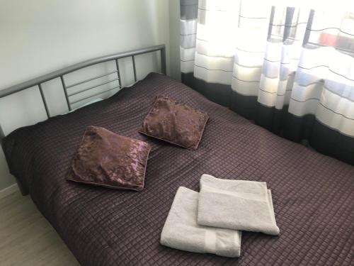 Posteľ alebo postele v izbe v ubytovaní Apartament Lucky
