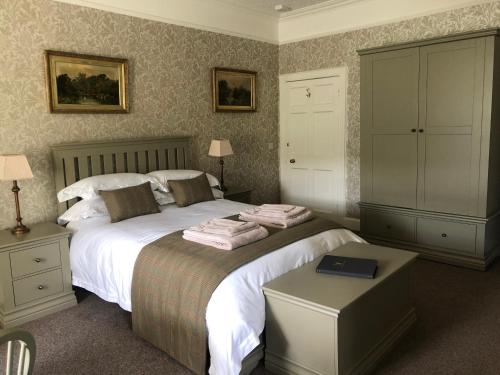 A bed or beds in a room at Branxholme Castle (Bed & Breakfast)