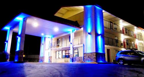 a building with blue lights on the front of it at Somatel Nashville Airport in Nashville