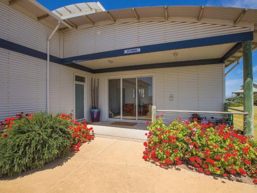 a building with flowers in front of it at Wytonia 1 in Port Fairy