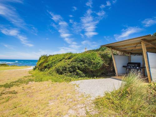 a beach house with a view of the ocean at WYTONIA 2 in Port Fairy