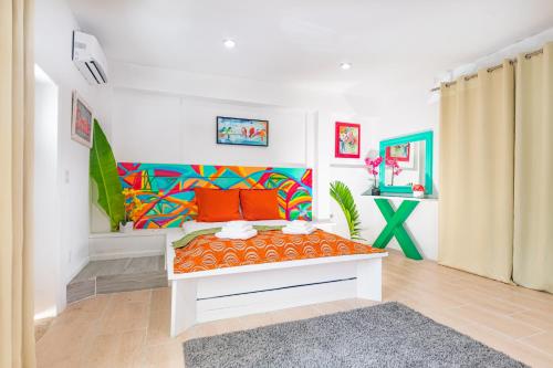 Cama o camas de una habitación en Studio 7 - Oceanfront Apartment