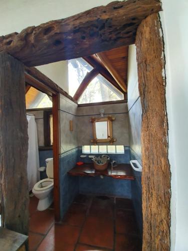 a bathroom with a sink and a toilet at Mar de los Poetas in Mar Azul