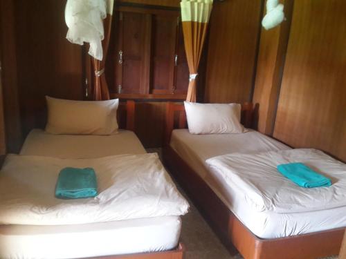 Postel nebo postele na pokoji v ubytování Phu View Guesthouse