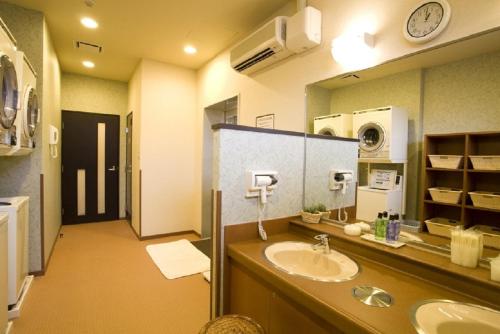 Hotel Route-Inn Odate Eki Minami tesisinde bir banyo