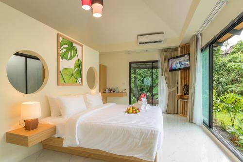 Katil atau katil-katil dalam bilik di Aonang Eco Villa - SHA Extra Plus