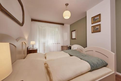 Ένα ή περισσότερα κρεβάτια σε δωμάτιο στο CHATA PODLESOK
