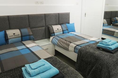 מיטה או מיטות בחדר ב-Sky Star Villa 25