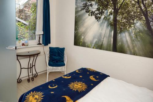 Postel nebo postele na pokoji v ubytování Bed & Breakfast Wesseloh
