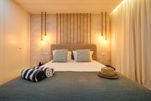 En eller flere senge i et værelse på Areias Senses